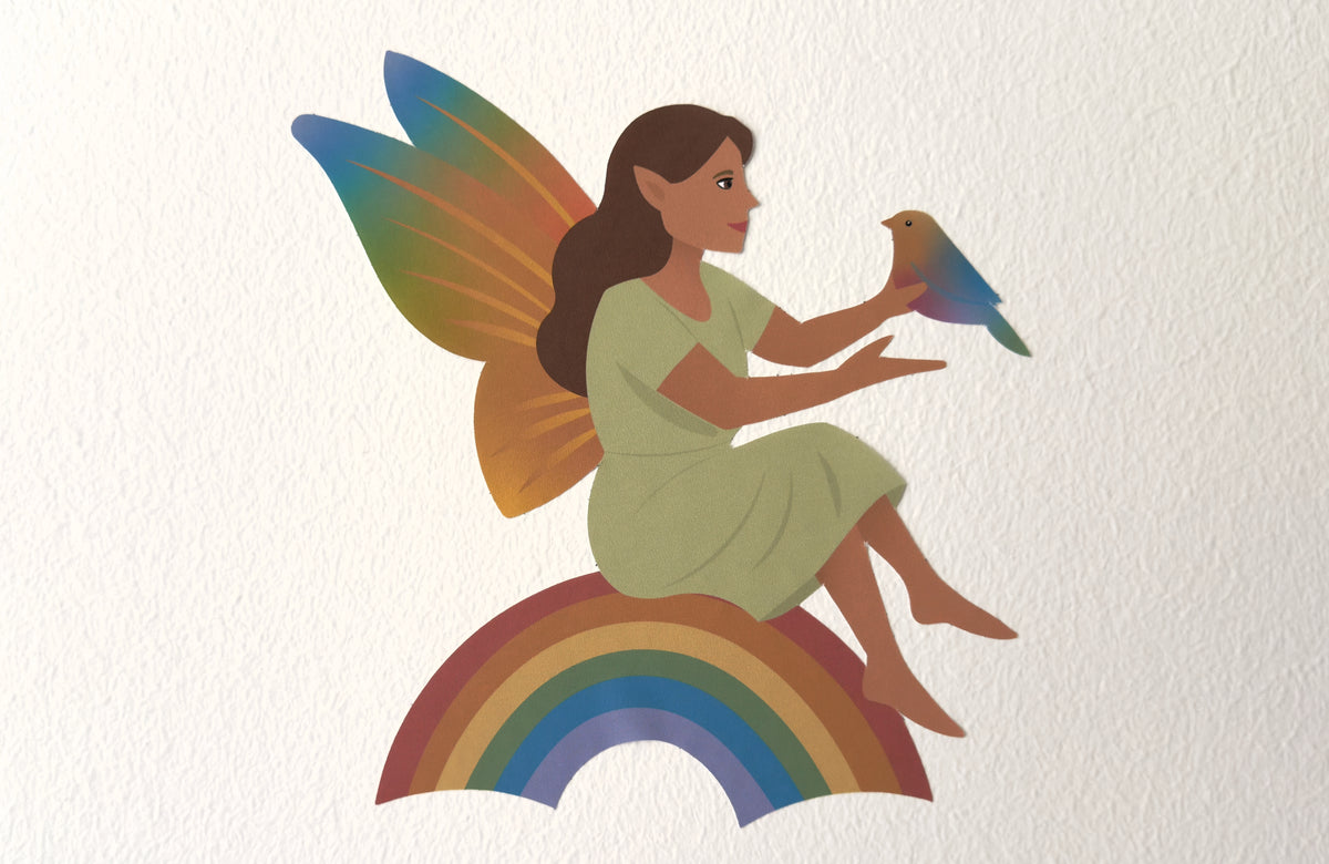 Wallsticker med regnbuefe på væg